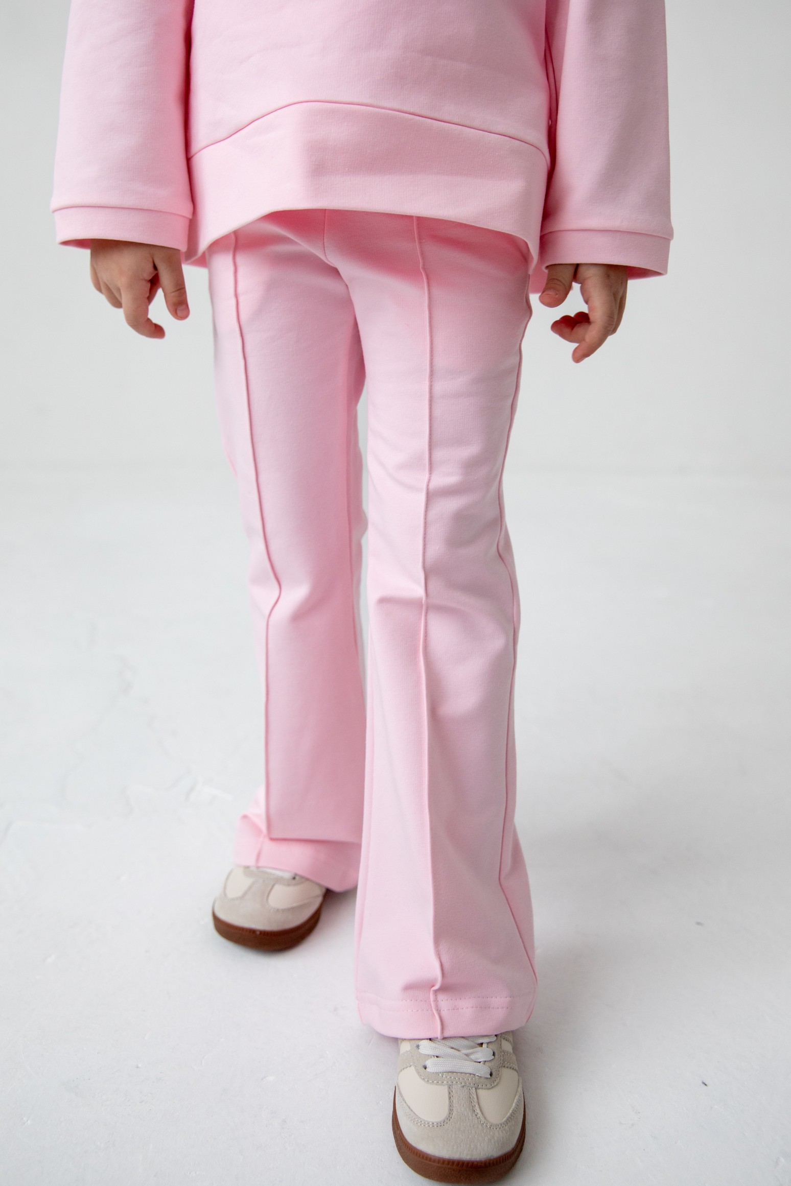 Комплект лонгслив с разрезами и брюки с декоративным швом