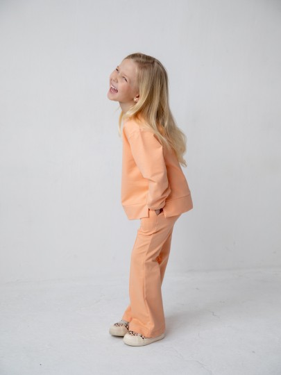 Комплект лонгслив с разрезами и брюки с декоративным швом