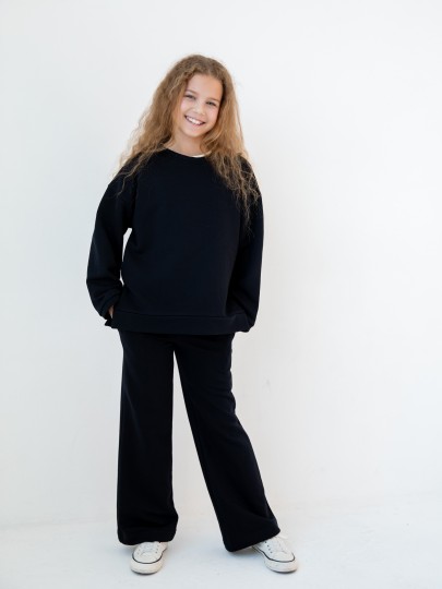 Костюм толстовка с разрезами и прямые брюки