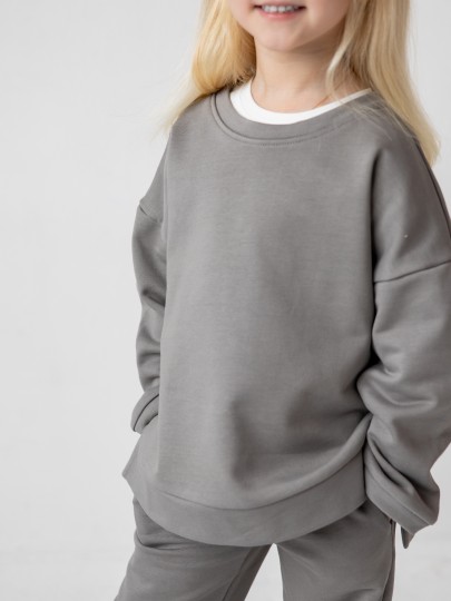 Костюм толстовка с разрезами и прямые брюки