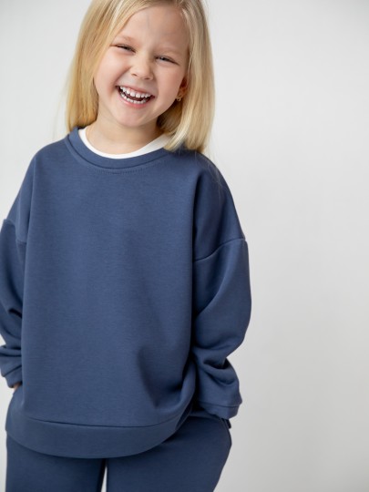 Костюм толстовка с разрезами и прямые брюки